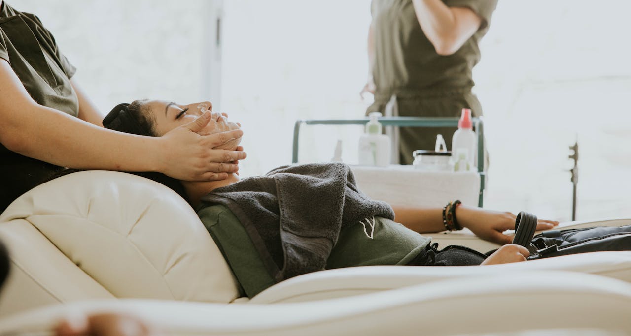 Home A serene spa session with facial massage, promoting relaxation and skincare.